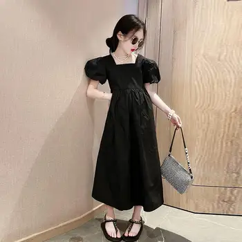 Черно однотонное рокля за момиче с къс ръкав, лято 2023, Нова Корейска версия, Дълга рокля на принцеса, мода за деца на средна и по-напреднала възраст