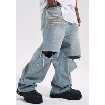 Старите дупки на коленете на улицата пране, панталони в стила на Wasteland, широки дънки-парцал, тенденция панталони-слонове
